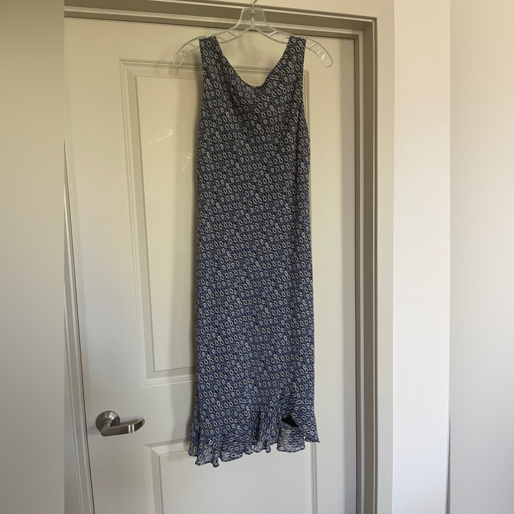 Donna Ricco Sleeveless Sheath Dress With Ruffled Hemline